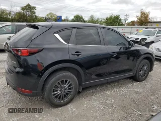 2020 Mazda CX-5 Touring with VIN JM3KFBCM1L0792706, listed as a Copart auction lot 73032144 with 56,845 mi miles and Salvage Title. Bid and sale history available at carsss.com. Image 3.