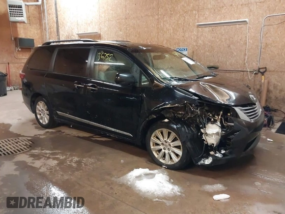 2015 Toyota Sienna Ltd with VIN 5TDDK3DCXFS122419, listed as a IAAI auction lot 41336752 with 243,567 mi miles. Bid and sale history available at carsss.com. Image 1.