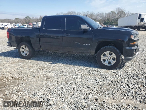 2018 Chevrolet Silverado 1500 LT with VIN 3GCUKREC3JG425552, listed as a Copart auction lot 46662535 with 122,469 mi miles and Salvage Title. Bid and sale history available at carsss.com. Image 4.