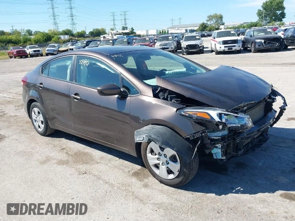 2018 Kia Forte LX with VIN 3KPFK4A70JE217385, listed as a IAAI auction lot 39955381 with 99,060 mi miles. Bid and sale history available at carsss.com. Image 1.