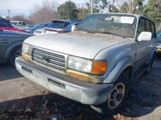 1997 Toyota Land Cruiser with VIN JT3HJ85J0V0186845, listed as a IAAI auction lot 41216993 with 278,082 mi miles. Bid and sale history available at carsss.com. Image 6.