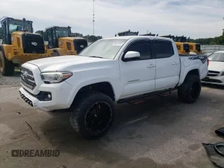 2017 Toyota Tacoma SR5 z VIN 5TFCZ5AN7HX052402, wystawiony jako Copart lot #60467845 z przebiegiem 146 515 mil mil oraz Czysty tytuł • Clean title. Historia ofert i sprzedaży dostępna na DreamBid. Obrazek 1.
