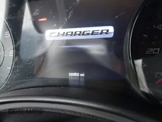2019 Dodge Charger SXT with VIN 2C3CDXBG6KH681711, listed as a IAAI auction lot 42130733 with 58,050 mi miles. Bid and sale history available at carsss.com. Image 7.