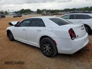 2016 Chrysler 300 with VIN 2C3CCABG8GH261391, listed as a Copart auction lot 54689084 with 82,574 mi miles and Salvage Title. Bid and sale history available at carsss.com. Image 2.