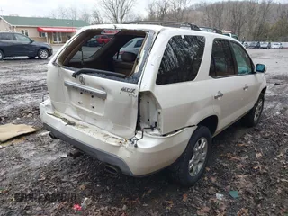 2004 Acura MDX Touring Pkg RES w/Nav with VIN 2HNYD18974H549920, listed as a IAAI auction lot 41696166 with 264,868 mi miles. Bid and sale history available at carsss.com. Image 4.