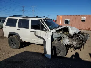 1996 Jeep Cherokee SE with VIN 1J4FJ28S0TL272778, listed as a Copart auction lot 83498634 with Not provided miles and Salvage title. Bid and sale history available at DreamBid. Image 4.
