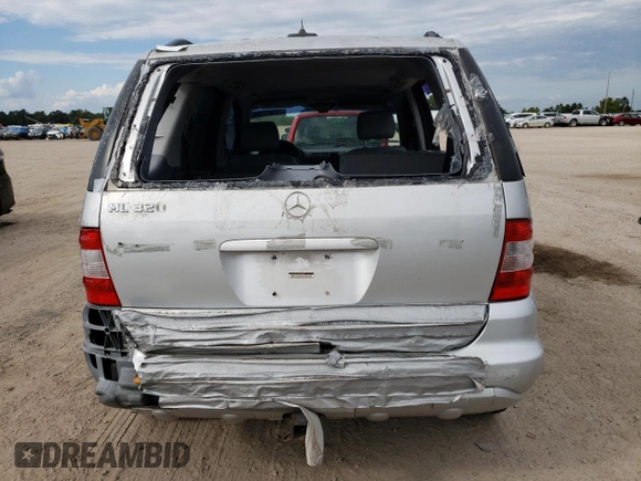 2002 Mercedes-Benz M-Class with VIN 4JGAB54E52A360097, listed as a Copart auction lot 72983104 with 199,445 mi miles and Salvage Title. Bid and sale history available at carsss.com. Image 6.