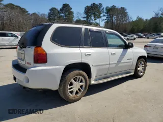 2006 GMC Envoy Denali with VIN 1GKET63M762190296, listed as a Copart auction lot 46691595 with 128,985 mi miles and Salvage Title. Bid and sale history available at carsss.com. Image 3.