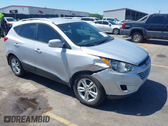 2013 Hyundai Tucson GLS with VIN KM8JU3AC3DU551018, listed as a IAAI auction lot 41988305 with 214,728 mi miles. Bid and sale history available at carsss.com. Image 1.