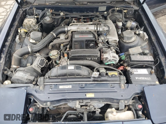 1988 Toyota Supra с VIN JT2MA71J0J0087102, выставлен на аукционе Copart как лот 78730904 с пробегом 83 787 миль миль и Чистый • Clean title. История ставок и продаж доступна на DreamBid. Изображение 11.