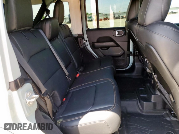 2024 Jeep Wrangler Sahara with VIN 1C4PJXEN6RW106911, listed as a Copart auction lot 58937945 with 13,948 mi miles and Salvage title. Bid and sale history available at DreamBid. Image 10.