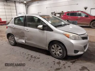 2012 Toyota Yaris L with VIN JTDKTUD34CD523773, listed as a IAAI auction lot 41616220 with 77,332 mi miles. Bid and sale history available at carsss.com. Image 1.