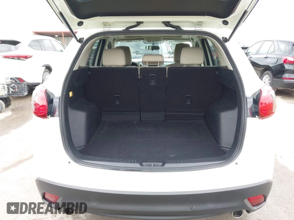 2015 Mazda CX-5 Touring with VIN JM3KE2CY3F0550624, listed as a IAAI auction lot 41931268 with 51,588 mi miles and . Bid and sale history available at carsss.com. Image 17.