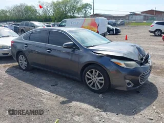 2014 Toyota Avalon Limited with VIN 4T1BK1EB3EU087911, listed as a IAAI auction lot 42070580 with 191,687 mi miles. Bid and sale history available at carsss.com. Image 1.