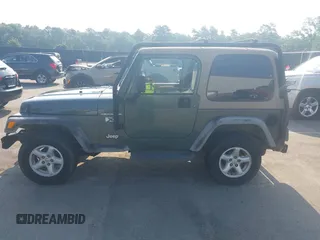 2002 Jeep Wrangler X with VIN 1J4FA39S72P733034, listed as a IAAI auction lot 42659447 with 200,786 mi miles and . Bid and sale history available at DreamBid. Image 14.