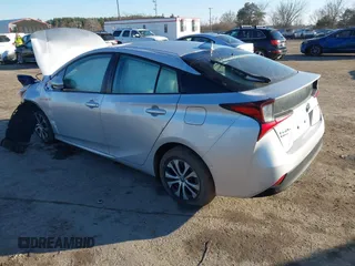 2020 Toyota Prius LE with VIN JTDL9RFU5L3013217, listed as a IAAI auction lot 41650064 with 124,704 mi miles and . Bid and sale history available at DreamBid. Image 3.