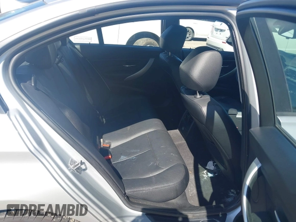 2013 BMW 3 Series 328i with VIN WBA3C1G52DNR44660, listed as a IAAI auction lot 41994277 with 165,151 mi miles and . Bid and sale history available at carsss.com. Image 8.