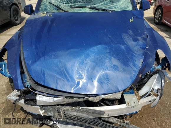 2022 Tesla Model Y Long Range z VIN 7SAYGDEE8NF447410, wystawiony jako Copart lot #54860765 z przebiegiem Nie podano mil oraz Szkody całkowita. Historia ofert i sprzedaży dostępna na DreamBid. Obrazek 11.