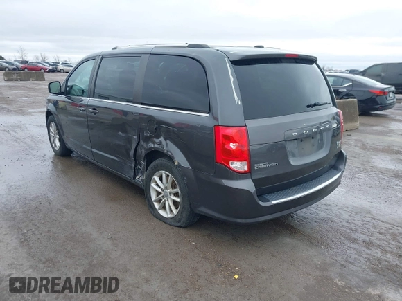 2019 Dodge Grand Caravan SXT with VIN 2C4RDGCG3KR543221, listed as a IAAI auction lot 41528859 with 129,778 mi miles and . Bid and sale history available at DreamBid. Image 3.