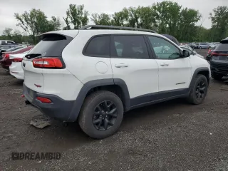2015 Jeep Cherokee Trailhawk with VIN 1C4PJMBS6FW680963, listed as a Copart auction lot 61306385 with 174,793 mi miles and Clean title. Bid and sale history available at DreamBid. Image 3.