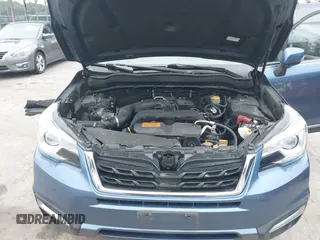 2018 Subaru Forester Touring with VIN JF2SJAWC6JH597365, listed as a IAAI auction lot 42606953 with 66,340 mi miles and . Bid and sale history available at DreamBid. Image 10.