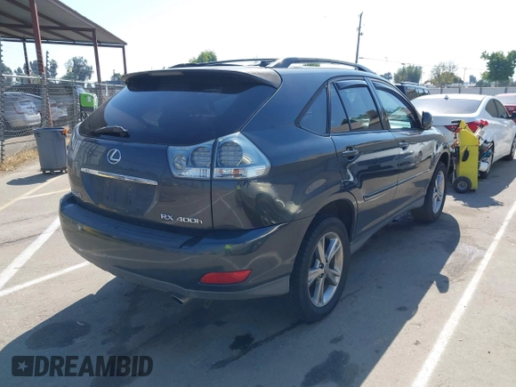2006 Lexus RX 400h with VIN JTJHW31U560009707, listed as a IAAI auction lot 42148672 with 198,569 mi miles and . Bid and sale history available at DreamBid. Image 4.