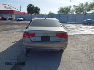 2012 Audi A8 z VIN WAURVAFD3CN024063, wystawiony jako IAAI lot #41706508 z przebiegiem Nie podano mil oraz . Historia ofert i sprzedaży dostępna na DreamBid. Obrazek 16.