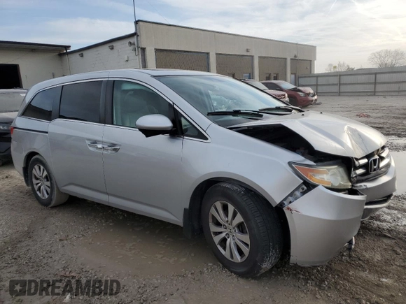 2014 Honda Odyssey EX-L with VIN 5FNRL5H62EB052131, listed as a Copart auction lot 49356065 with 138,551 mi miles and Salvage Title. Bid and sale history available at DreamBid. Image 4.