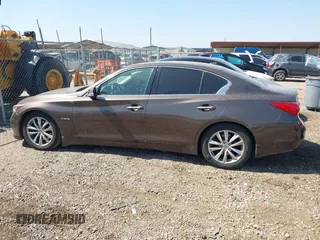 2014 Infiniti Q50 Hybrid Premium with VIN JN1AV7AP7EM691329, listed as a IAAI auction lot 41858913 with 144,688 mi miles and . Bid and sale history available at DreamBid. Image 14.