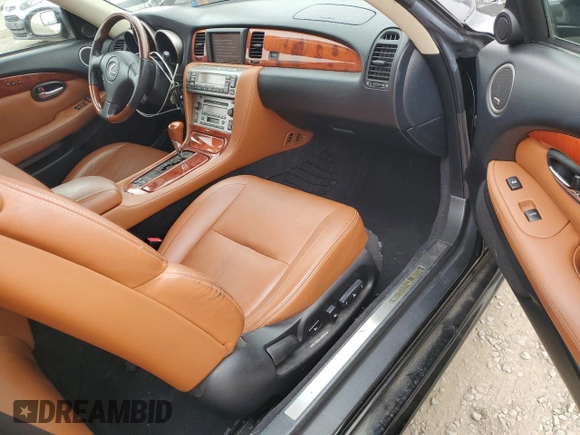 2003 Lexus SC 430 z VIN JTHFN48Y030039882, wystawiony jako Copart lot #50581485 z przebiegiem 43 439 mil mil oraz Szkoda całkowita • Salvage title. Historia ofert i sprzedaży dostępna na DreamBid. Obrazek 8.