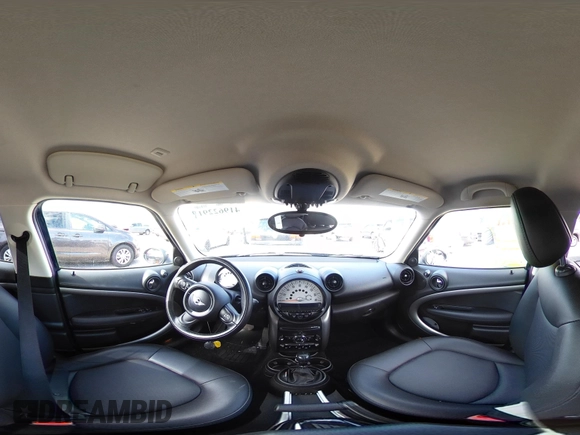 2013 MINI Countryman with VIN WMWZB3C58DWM07817, listed as a IAAI auction lot 41962291 with 60,763 mi miles and . Bid and sale history available at DreamBid. Image 19.