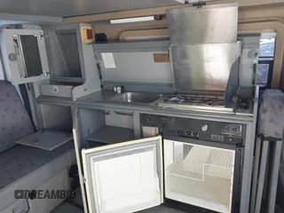 1997 Volkswagen EuroVan CV с VIN WV2EH8705VH077041, выставлен на аукционе IAAI как лот 42481515 с пробегом 144 миль миль и . История ставок и продаж доступна на DreamBid. Изображение 13.