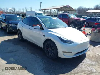 2021 Tesla Model Y Performance with VIN 5YJYGDEF8MF246658, listed as a IAAI auction lot 41679793 with 28,015 mi miles. Bid and sale history available at carsss.com. Image 1.