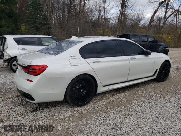 2017 BMW 7 Series 740e xDrive iPerformance with VIN WBA7J2C36HG497830, listed as a Copart auction lot 79948304 with 43,029 mi miles and Salvage Title. Bid and sale history available at carsss.com. Image 3.