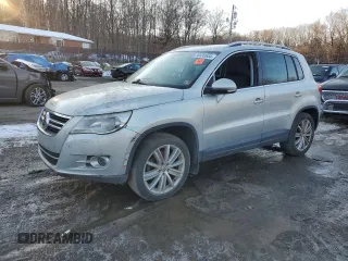 2011 Volkswagen Tiguan SE with VIN WVGBV7AXXBW519633, listed as a Copart auction lot 86830654 with Not provided miles and Salvage title. Bid and sale history available at DreamBid. Image 1.