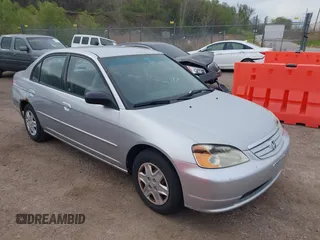 2003 Honda Civic LX with VIN 2HGES16533H571332, listed as a IAAI auction lot 42153221 with 202,926 mi miles. Bid and sale history available at carsss.com. Image 1.