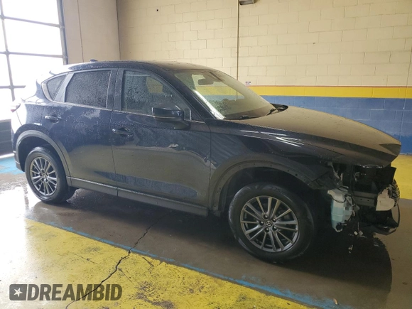2021 Mazda CX-5 Touring with VIN JM3KFACMXM0334139, listed as a Copart auction lot 55362905 with 117,279 mi miles and Clean Title. Bid and sale history available at DreamBid. Image 4.