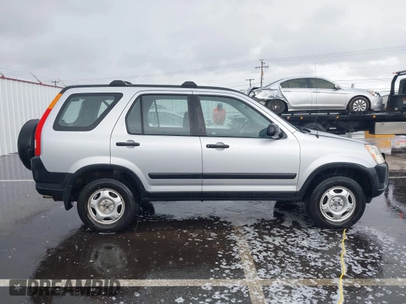 2004 Honda CR-V LX with VIN JHLRD78484C007197, listed as a IAAI auction lot 41581380 with 230,537 mi miles and . Bid and sale history available at carsss.com. Image 13.