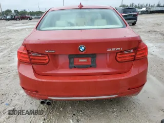 2014 BMW 3 Series 328i xDrive with VIN WBA3B3C59EJ977670, listed as a Copart auction lot 61997165 with 128,937 mi miles and Salvage title. Bid and sale history available at DreamBid. Image 6.
