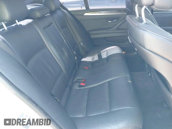 2013 BMW 5 Series 528i with VIN WBAXG5C57DD229608, listed as a IAAI auction lot 41999493 with 147,003 mi miles and . Bid and sale history available at carsss.com. Image 8.