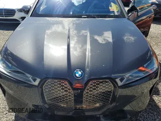 2024 BMW iX M60 z VIN WB533CF00RCN01751, wystawiony jako Copart lot #74145244 z przebiegiem 21 347 mil mil oraz Szkoda całkowita • Salvage title. Historia ofert i sprzedaży dostępna na DreamBid. Obrazek 12.