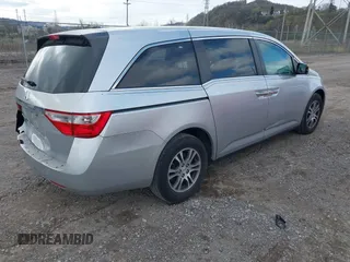 2011 Honda Odyssey EX-L with VIN 5FNRL5H60BB012206, listed as a IAAI auction lot 41982987 with 220,913 mi miles and . Bid and sale history available at carsss.com. Image 4.