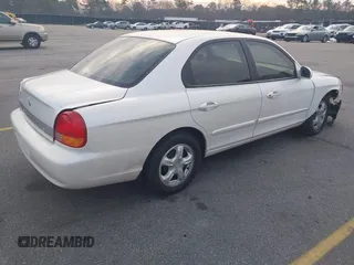 2000 Hyundai Sonata with VIN KMHWF25S3YA327184, listed as a IAAI auction lot 41771540 with 84,783 mi miles. Bid and sale history available at carsss.com. Image 4.