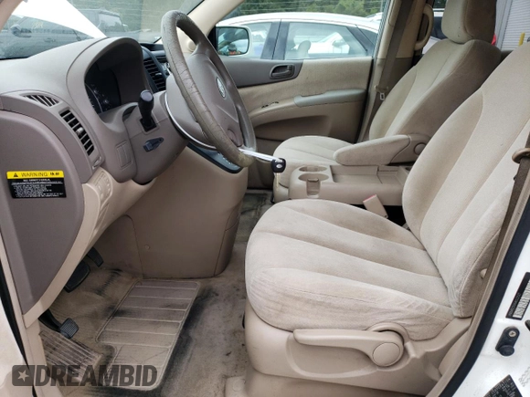 2006 Kia Sedona LX with VIN KNDMB233466022537, listed as a Copart auction lot 71130354 with 215,997 mi miles and Salvage Title. Bid and sale history available at carsss.com. Image 7.