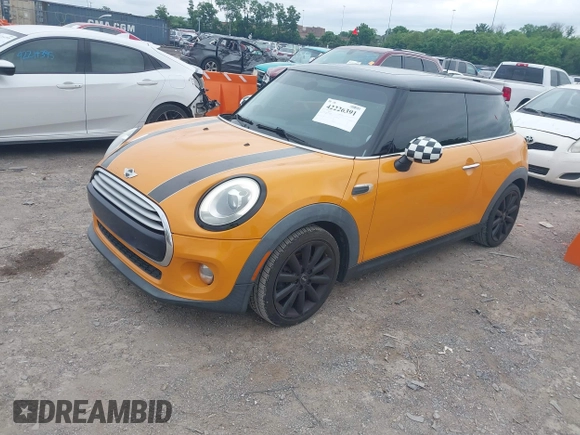 2015 MINI Hardtop with VIN WMWXM5C58FT942888, listed as a IAAI auction lot 42226391 with 61,935 mi miles and . Bid and sale history available at DreamBid. Image 2.