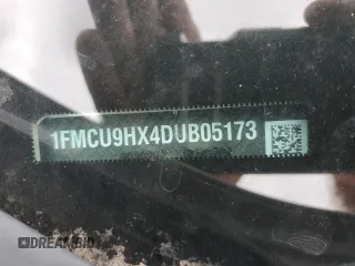 2013 Ford Escape SEL z VIN 1FMCU9HX4DUB05173, wystawiony jako Copart lot #57918125 z przebiegiem 197 195 mil mil oraz Szkoda całkowita • Salvage title. Historia ofert i sprzedaży dostępna na DreamBid. Obrazek 13.