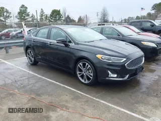 2019 Ford Fusion Titanium with VIN 3FA6P0K93KR243148, listed as a IAAI auction lot 41757469 with 78,859 mi miles. Bid and sale history available at carsss.com. Image 1.