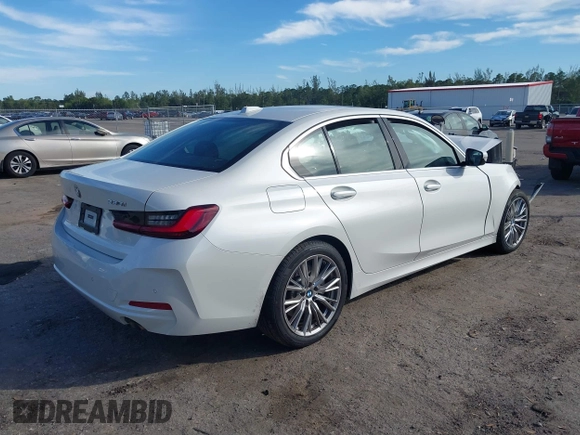 2024 BMW 3 Series 330i with VIN 3MW69FF07R8E63764, listed as a IAAI auction lot 41428605 with 5,355 mi miles. Bid and sale history available at carsss.com. Image 4.