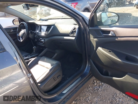 2016 Hyundai Tucson Eco with VIN KM8J3CA2XGU103017, listed as a IAAI auction lot 41897807 with 95,722 mi miles. Bid and sale history available at carsss.com. Image 5.