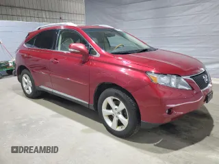 2011 Lexus RX 350 with VIN 2T2BK1BA0BC096540, listed as a Copart auction lot 48658195 with 123,672 mi miles and Salvage Title. Bid and sale history available at DreamBid. Image 4.
